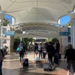 PSP Airport - travelers in concourse image