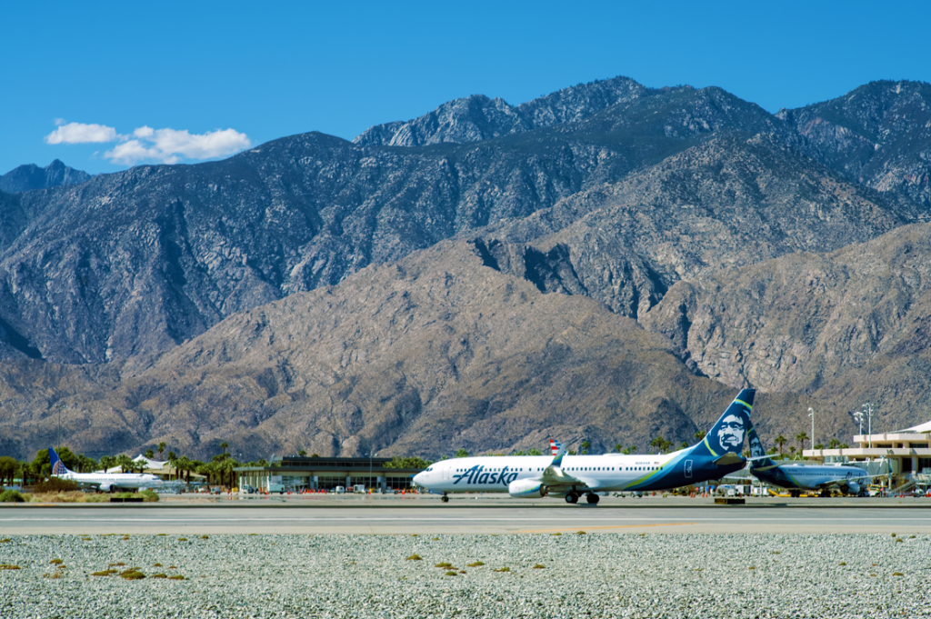 PSP - Alaska Airlines jet taking off photo.