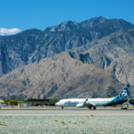 PSP - Alaska Airlines jet taking off photo.