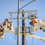 IID - linemen working IID - linemen working image