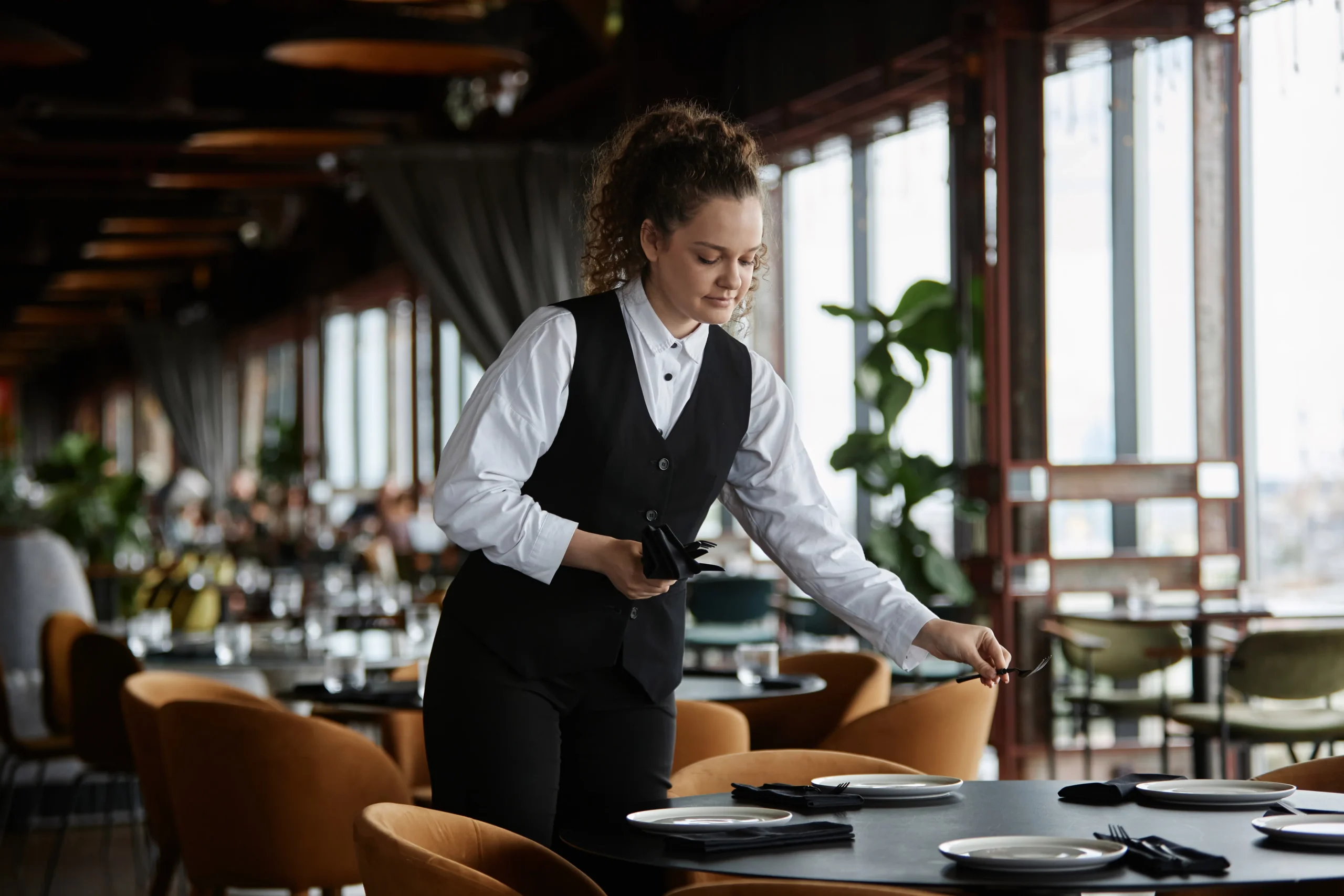 Unemployment - waitress in empty restaurant image